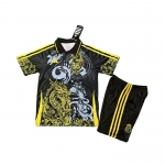 Camiseta Real Madrid Dragon Nino 25-26 Negro Amarillo Camiseta Real Madrid Dragon Nino 25-26 Negro Amarillo