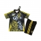Camiseta Real Madrid Dragon Nino 25-26 Negro Amarillo Camiseta Real Madrid Dragon Nino 25-26 Negro Amarillo
